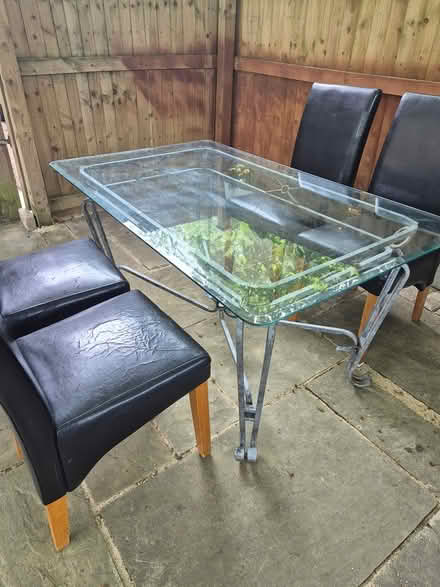 Photo of free Glass top table 4 chairs (Cheltenham) #1