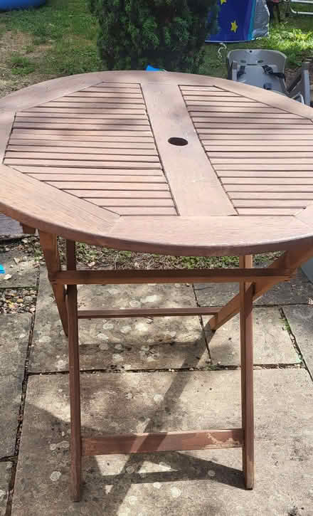Photo of free Round wooden garden table (Fairfield Park SG5) #2