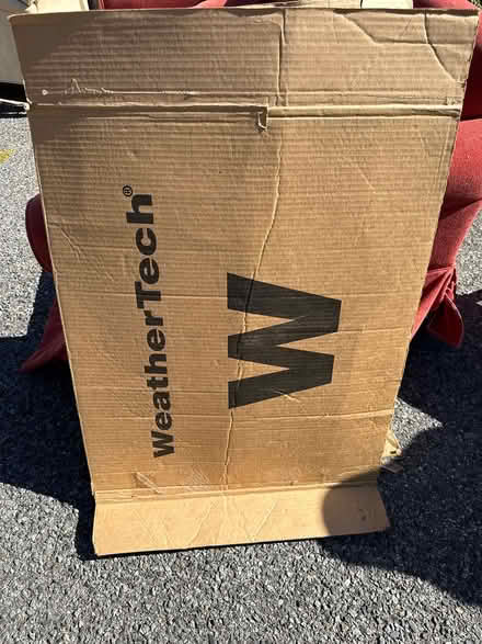 Photo of free Weather tech floor mat F150 new (Rising Sun) #3