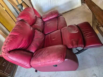 Photo of free Leather Reclining love seat (Macomb North ave) #2