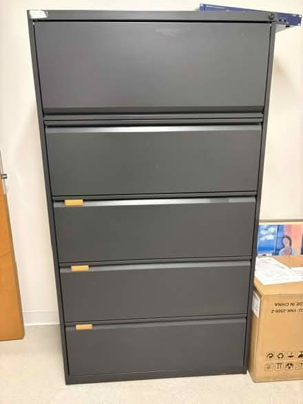 Photo of free Tall file cabinet (Wilshire and 20th) #1