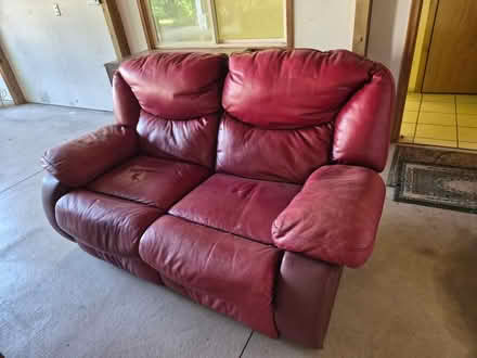 Photo of free Leather Reclining love seat (Macomb North ave) #1