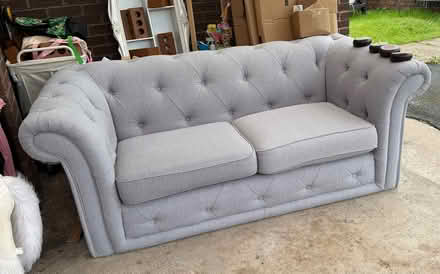 Photo of free 2 seater grey chesterfield sofa (WN4) #1