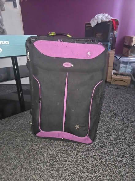 Photo of free Well.used suitcase on wheels (Derby city centre) #1
