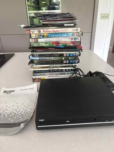 Photo of free Bush DVD player + various DVDs (Timperley WA15) #1