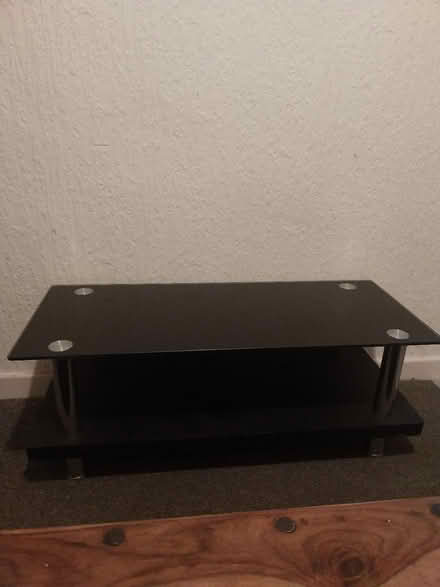 Photo of free Black glass tv/ coffee table (stockport shaw heath SK2) #1