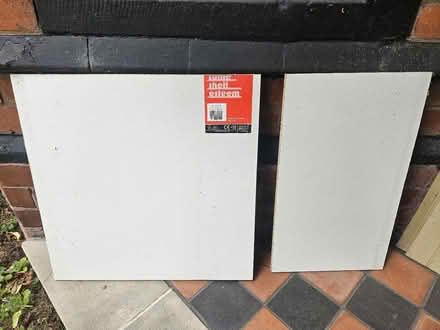 Photo of free 2 pieces shelving chipboard (Northgate Village CH2) #1