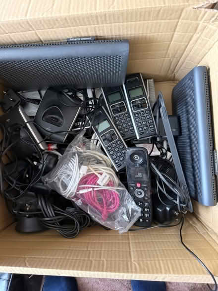 Photo of free Mix of modems, AC adaptors & phones (Croydon. CR2 9) #1