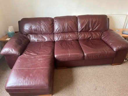 Photo of free Maroon leather three seater sofa (Leckhampton) #1