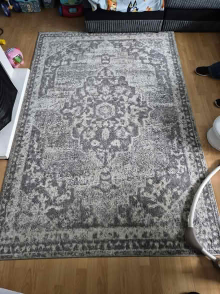 Photo of free Grey rug (LE77AD) #1