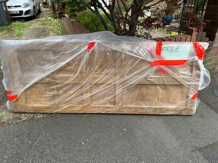Photo of free Interior pine door w/ brass handle (TW7) #1
