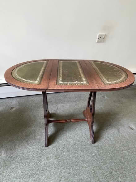 Photo of free Side table, wood with green leather decorated top (Bosham PO18) #1