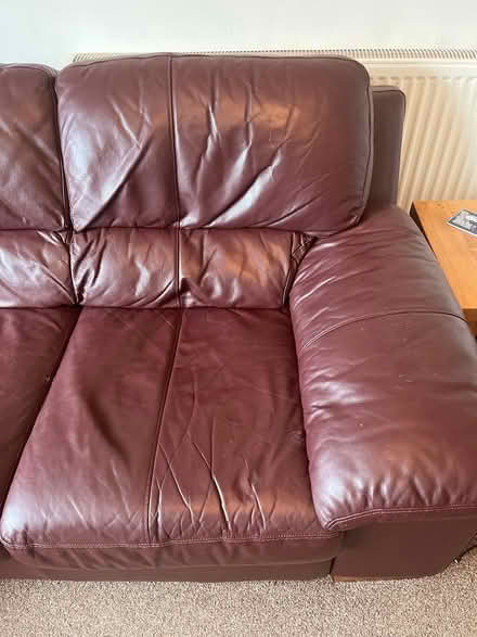 Photo of free Maroon leather three seater sofa (Leckhampton) #2