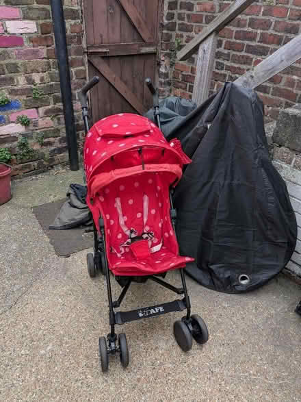Photo of free I safe dots and bows buggy (Heaton NE6) #1