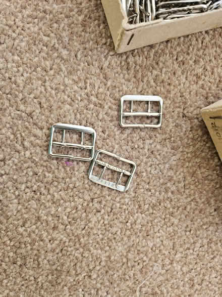 Photo of free box full of small belt hooks (Woodingdean BN2) #1