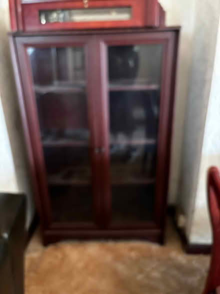Photo of free Display Cabinet Dark Wood Glass Doors (Rochford SS4) #1