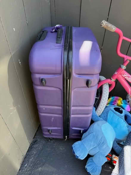 Photo of free Toys, kid’s bike, suitcase (1075 Valencia Avenue) #3