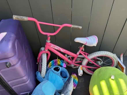 Photo of free Toys, kid’s bike, suitcase (1075 Valencia Avenue) #4