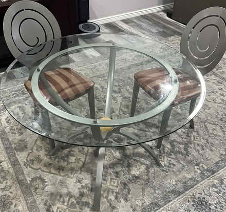 Photo of free Glass top metal table (10437 Isle St, Parker, 80134) #1