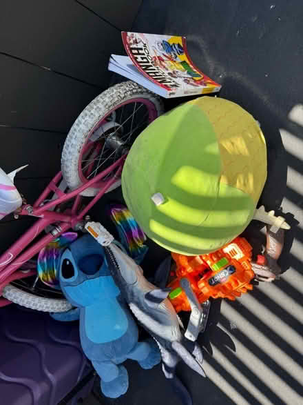 Photo of free Toys, kid’s bike, suitcase (1075 Valencia Avenue) #2