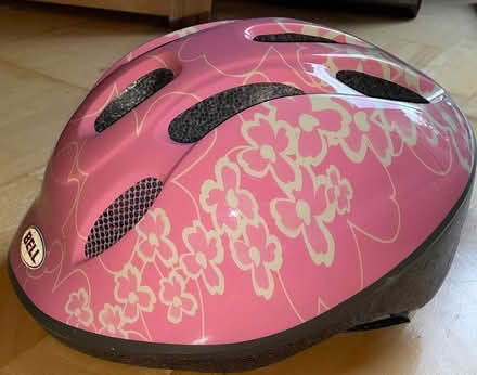 Photo of free Two child cycle helmets - pink and blue (Barkham RG41) #1