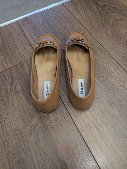 Photo of free Tan flats (Millwall E14) #2