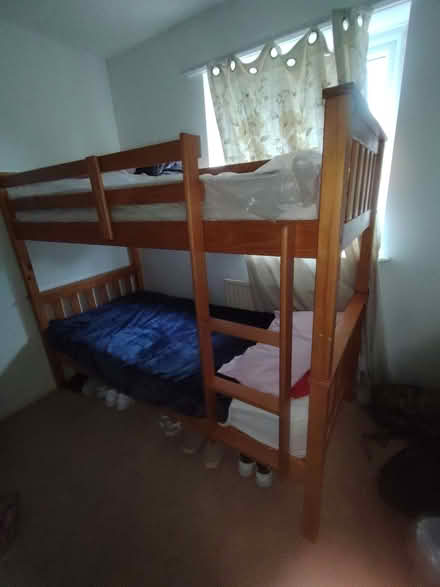 Photo of free Wooden bunk bed (Goldsworth Park GU21) #1