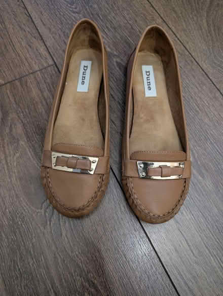 Photo of free Tan flats (Millwall E14) #1