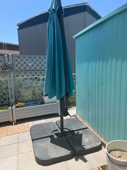 Photo of free patio umbrella and stand (Carson) #2