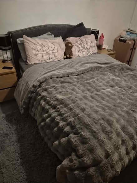 Photo of free Grey material kingsize bedframe (Claygate) #3