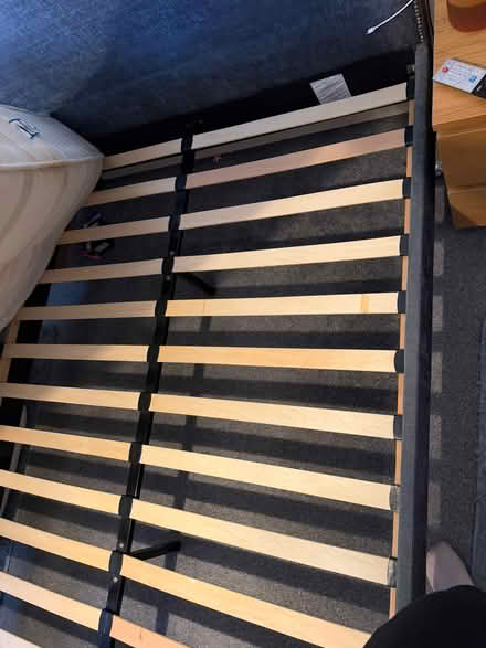 Photo of free Grey material kingsize bedframe (Claygate) #4