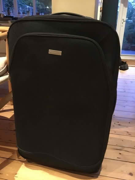 Photo of free Large suitcase (New Marston OX3) #1