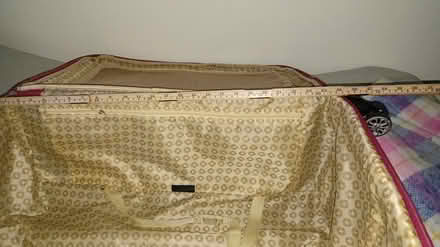 Photo of free Large suitcase (near Britannia Plaza) #4