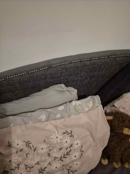 Photo of free Grey material kingsize bedframe (Claygate) #2