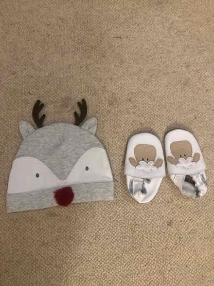 Photo of free Unised baby hat and sheep slippers (Stoke newington N16) #1