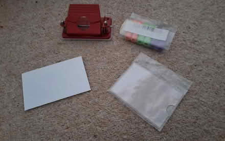 Photo of free Hole punch, pen grips, envelope etc (South Acton) #1