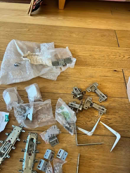 Photo of free Wren kitchen hinges, brackets and miscellaneous screw parts (Motspur Park KT3) #2