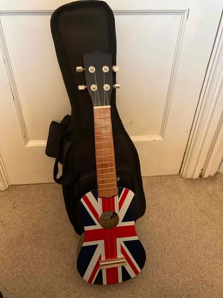 Photo of free Child’s Ukelele and case (Bh20) #1