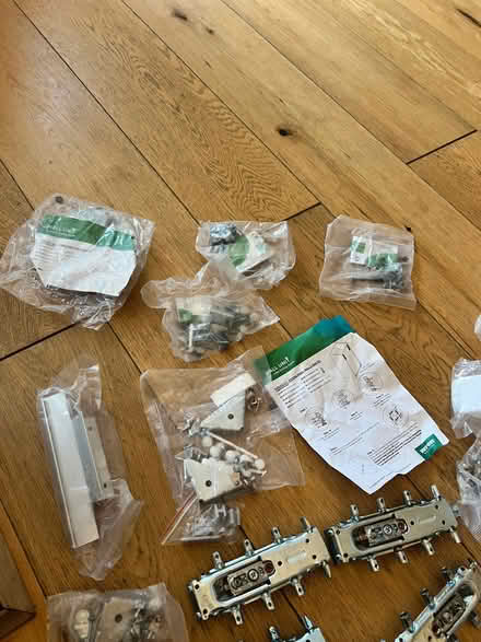 Photo of free Wren kitchen hinges, brackets and miscellaneous screw parts (Motspur Park KT3) #3