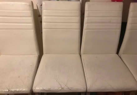 Photo of free 4 cream faux leather dinner chairs (Epsom KT18) #2