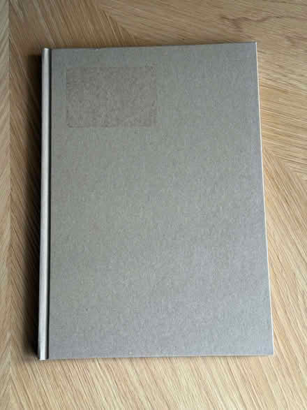 Photo of free A4 notebook with ruled pages and light brown hard covers (Lower Earley RG6) #1
