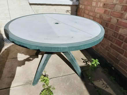 Photo of free Plastic round garden table (Stepney E1) #1