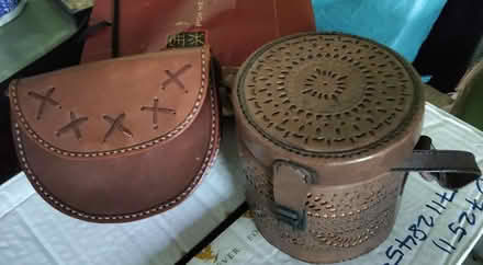 Photo of free Small leather sling bags (Braddell mrt stn) #1