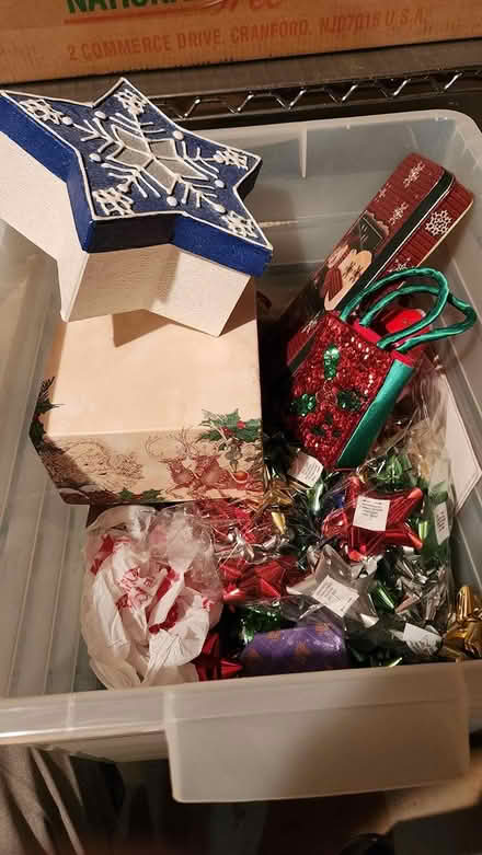 Photo of free Plastic bin of holiday gift stuff (West Springfield) #1
