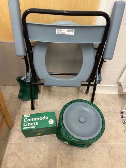 Photo of free Portable commode + a box of liners (Ferndown BH22) #1