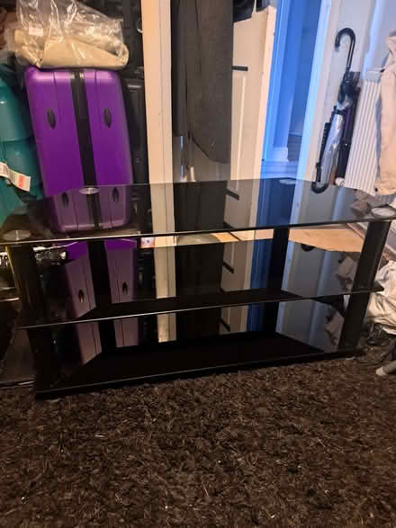 Photo of free Black, glass TV Display unit nearly new (Newton G72) #1