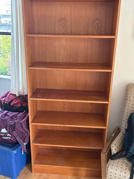 Photo of free Tall wood shelf (West end Harwood and jervis) #1