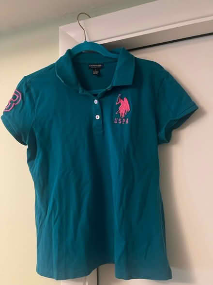 Photo of free Polo size large women’s (S Section) #1