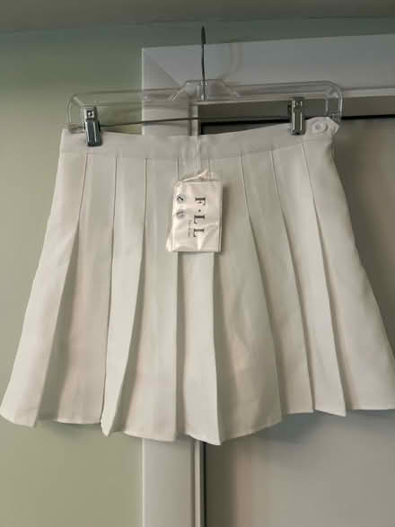 Photo of free New with tags: large white skirt (S Section) #1