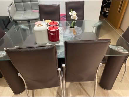 Photo of free A glass dinning table with 6 chairs (SS12) #1